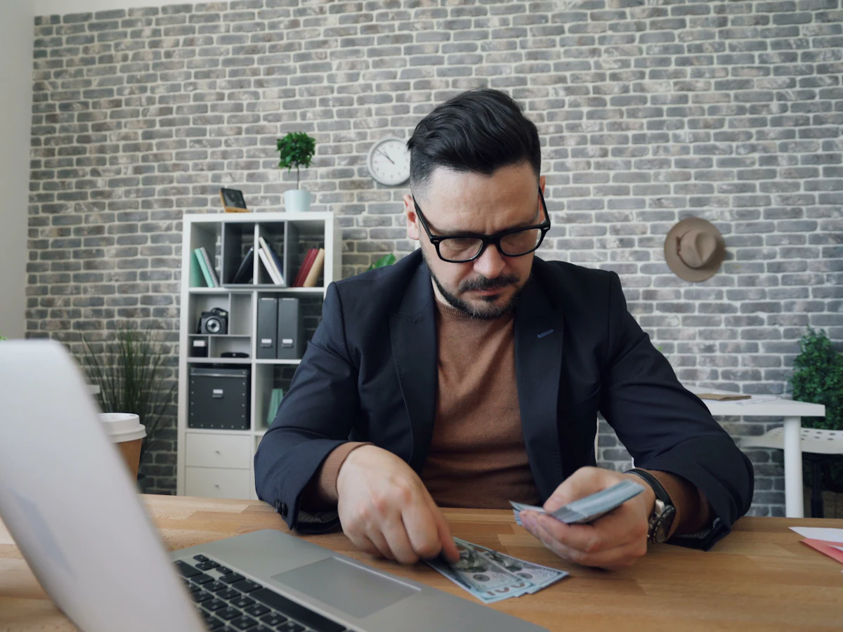 Accountant working at a desk in an advisory firm