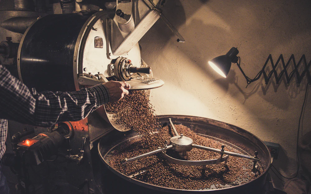 Coffee roaster roasting fresh beans